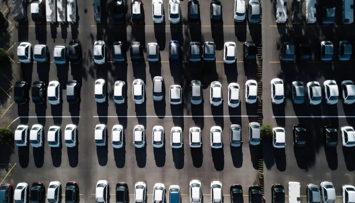 Abundance of cars in crowded parking lot generated by AI